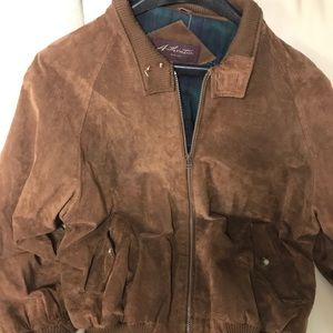 Men’s brown leather jacket, green plaid lining